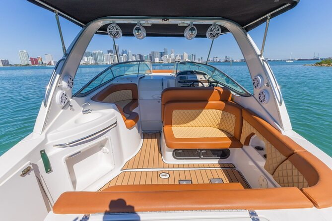 Explore Miami in Style: Private Boat Cruise Tour with Captain - The Boat Setup: Water, Tunes, and a Restroom (Yes, Really)
