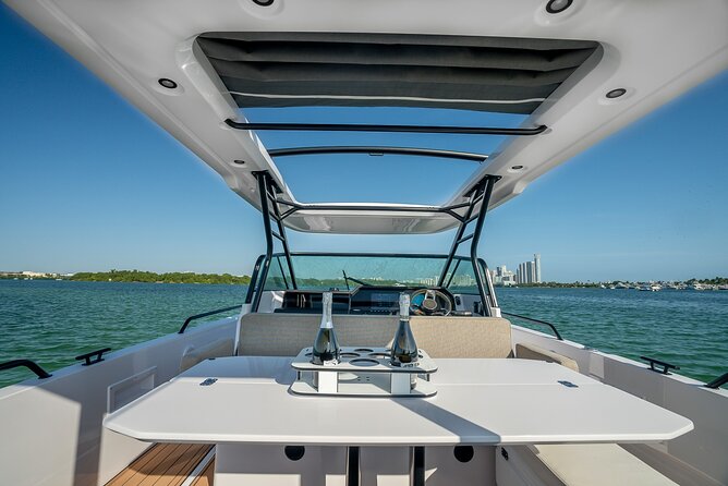 Miami Bay Discovery Private Yacht Cruise with Captain - Stop 1: Haulover Beach Park Sandbar Hour (Swim, Eat, Chill)