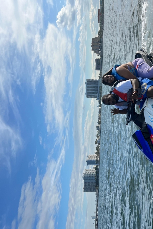 Miami: Miami Beach Jetski Ride with Boat and Drinks - Biscayne Bay jet ski time: speed control, wildlife chances, and big-sky views
