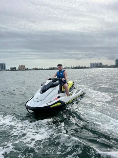 Miami: Miami Beach Jetski Ride with Boat and Drinks - River boat transfer: why the 30 minutes on the water feels like part of the show