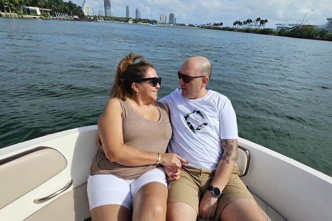 Miami Shared Boat tour, 2 hours on a 24 ft boat. 6 people total. - What to Bring: Drinks, Sunscreen, and a Rain Plan